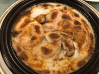 鍋の中のピザ

自動的に生成された説明