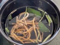 容器の中のスープ

中程度の精度で自動的に生成された説明
