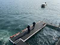 水に浮かんでいる船

中程度の精度で自動的に生成された説明