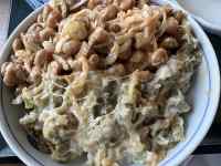 ボウルに盛られた食べ物
AI 生成コンテンツは誤りを含む可能性があります。